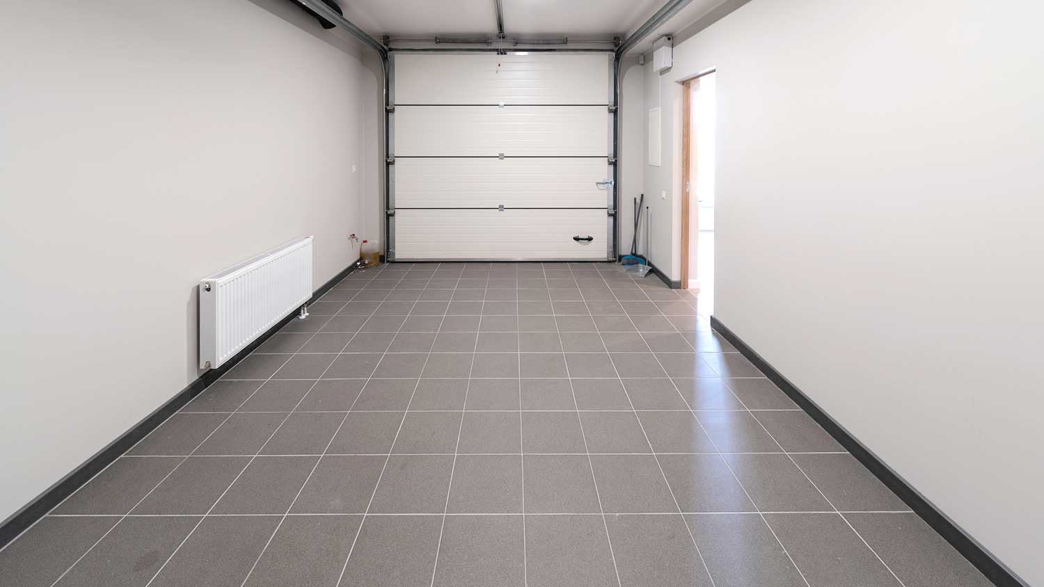 Home garage interior with tile flooring