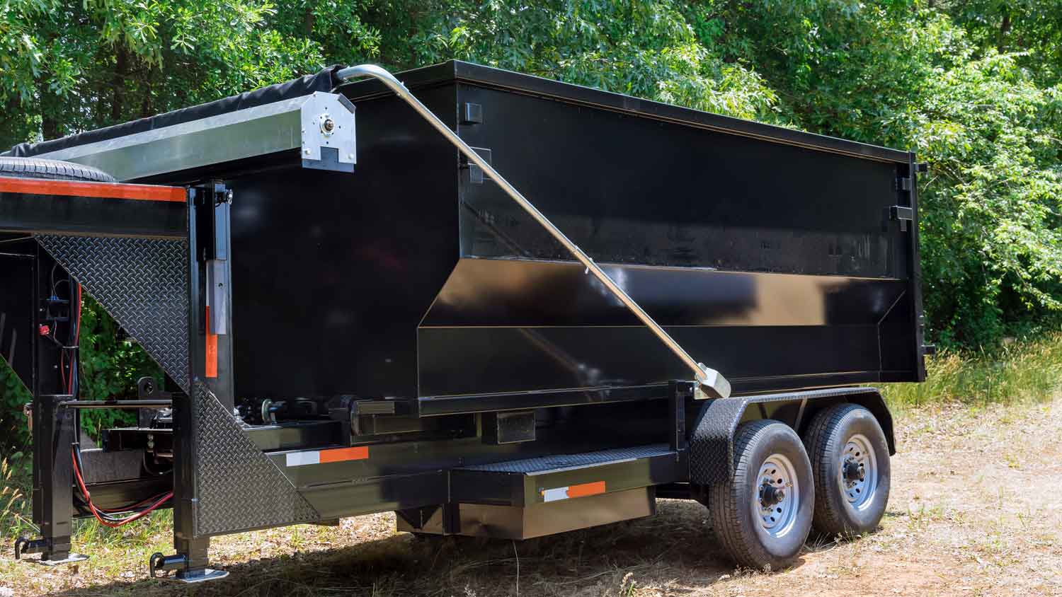 A black dump trailer