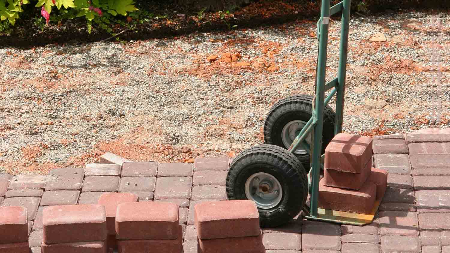 patio brick and dolly in yard