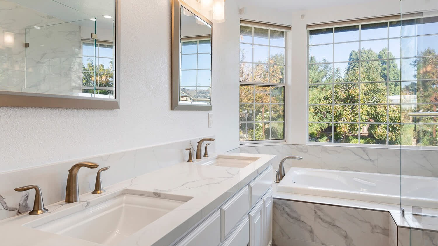Master bathroom with bathtub
