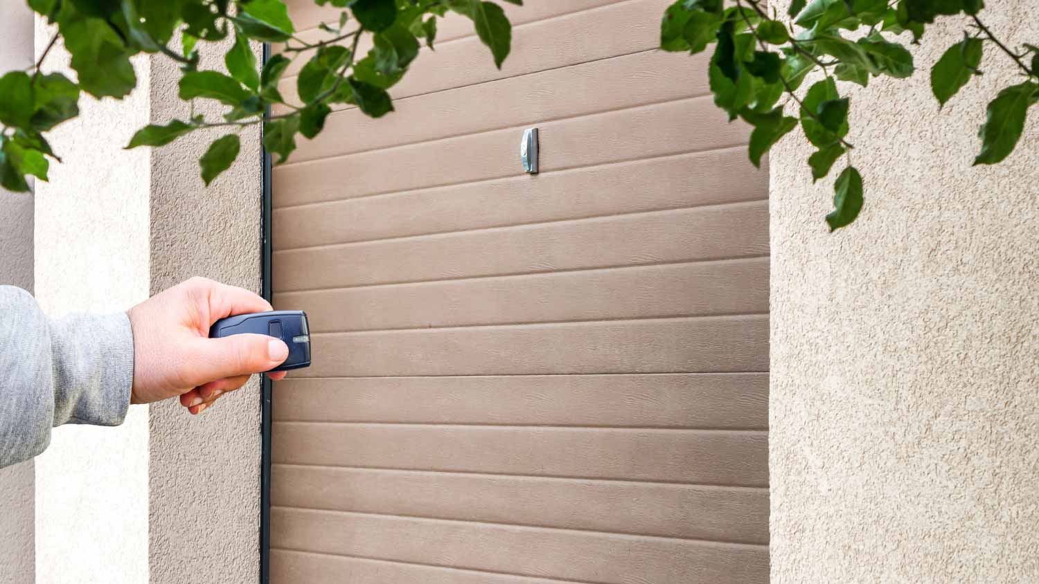 Man closing garage door