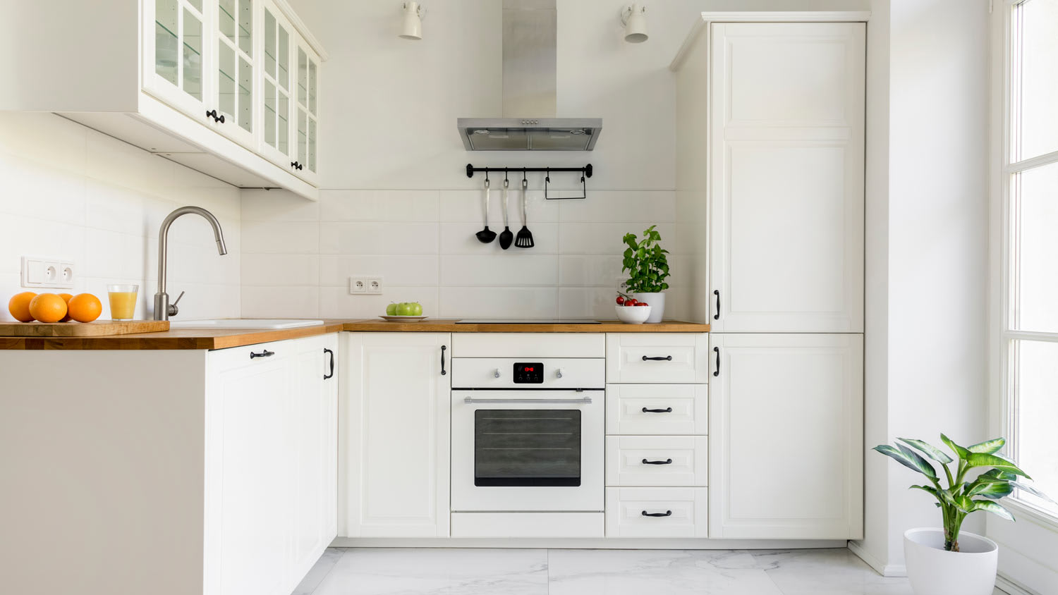 white minimal l shape kitchen