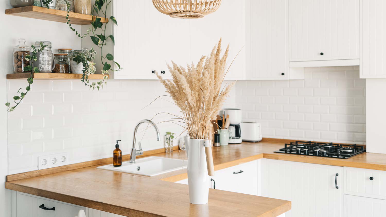 A modern Scandinavian U-shaped kitchen
