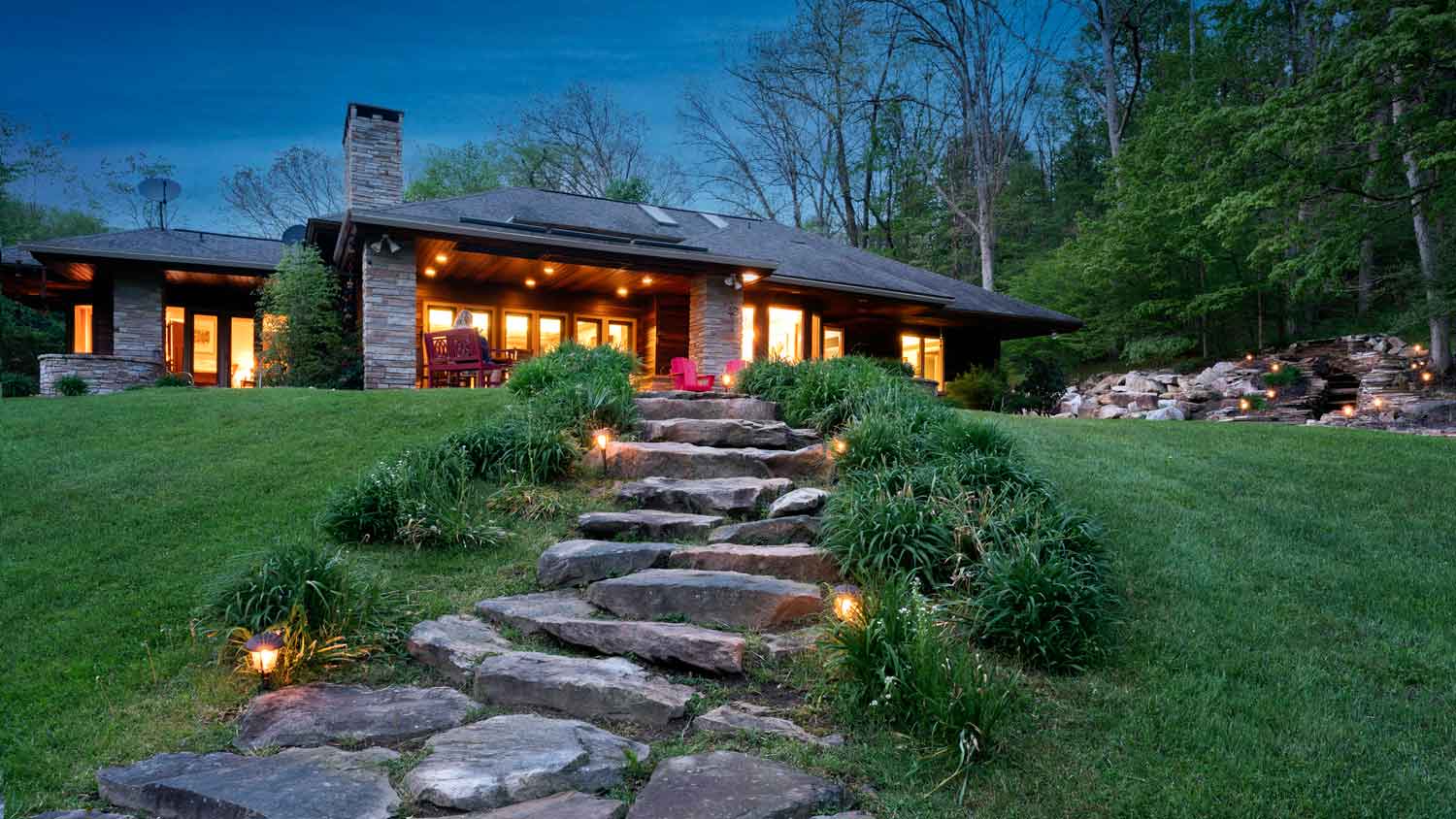 A prairie style house with stone steps