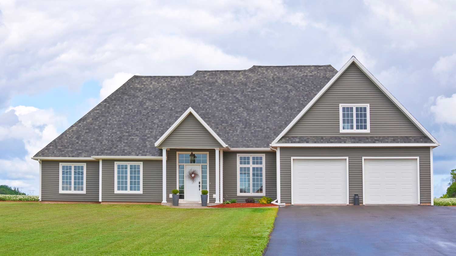 A family house with a gray roof