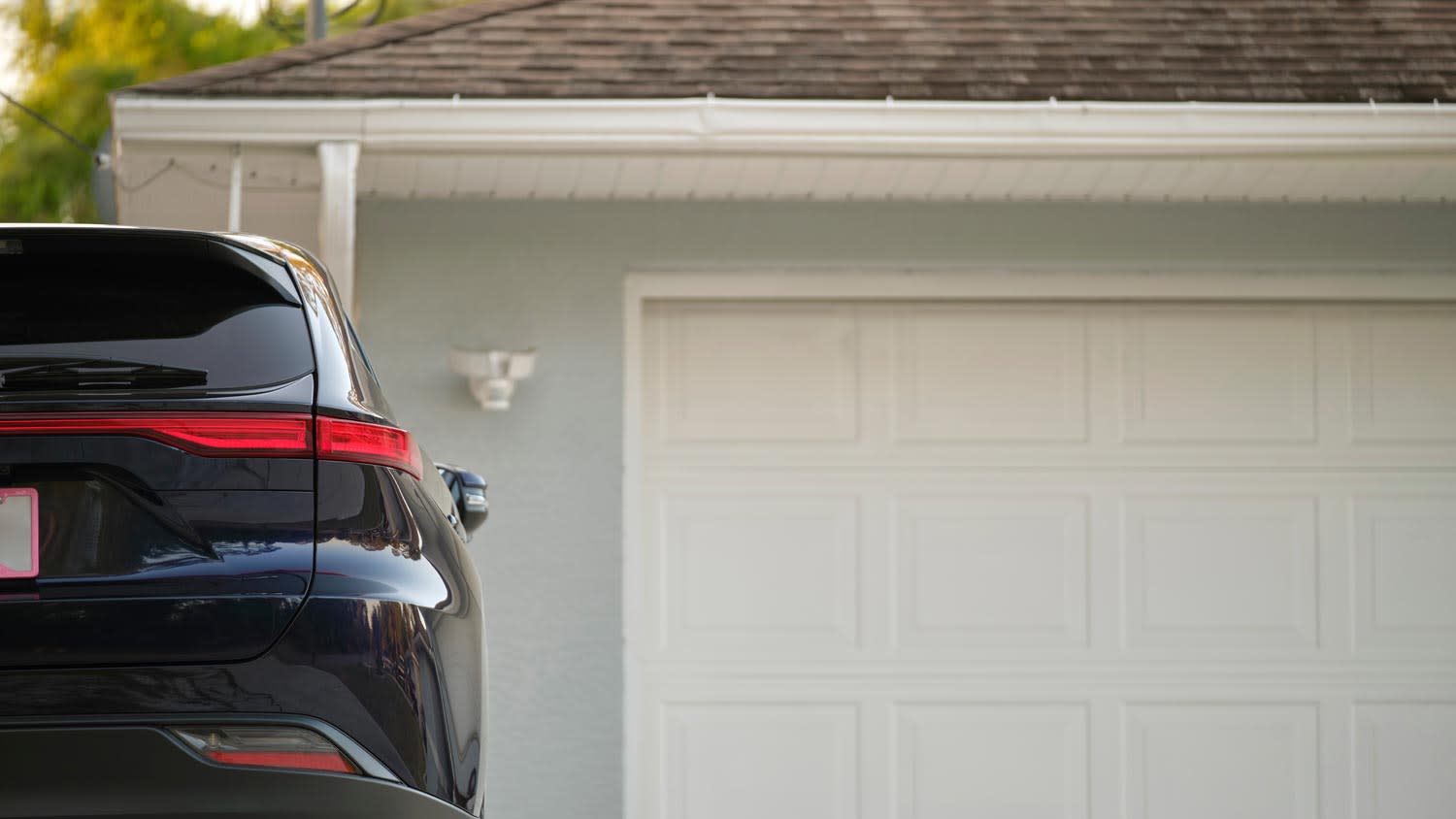 A car outside a residential garage