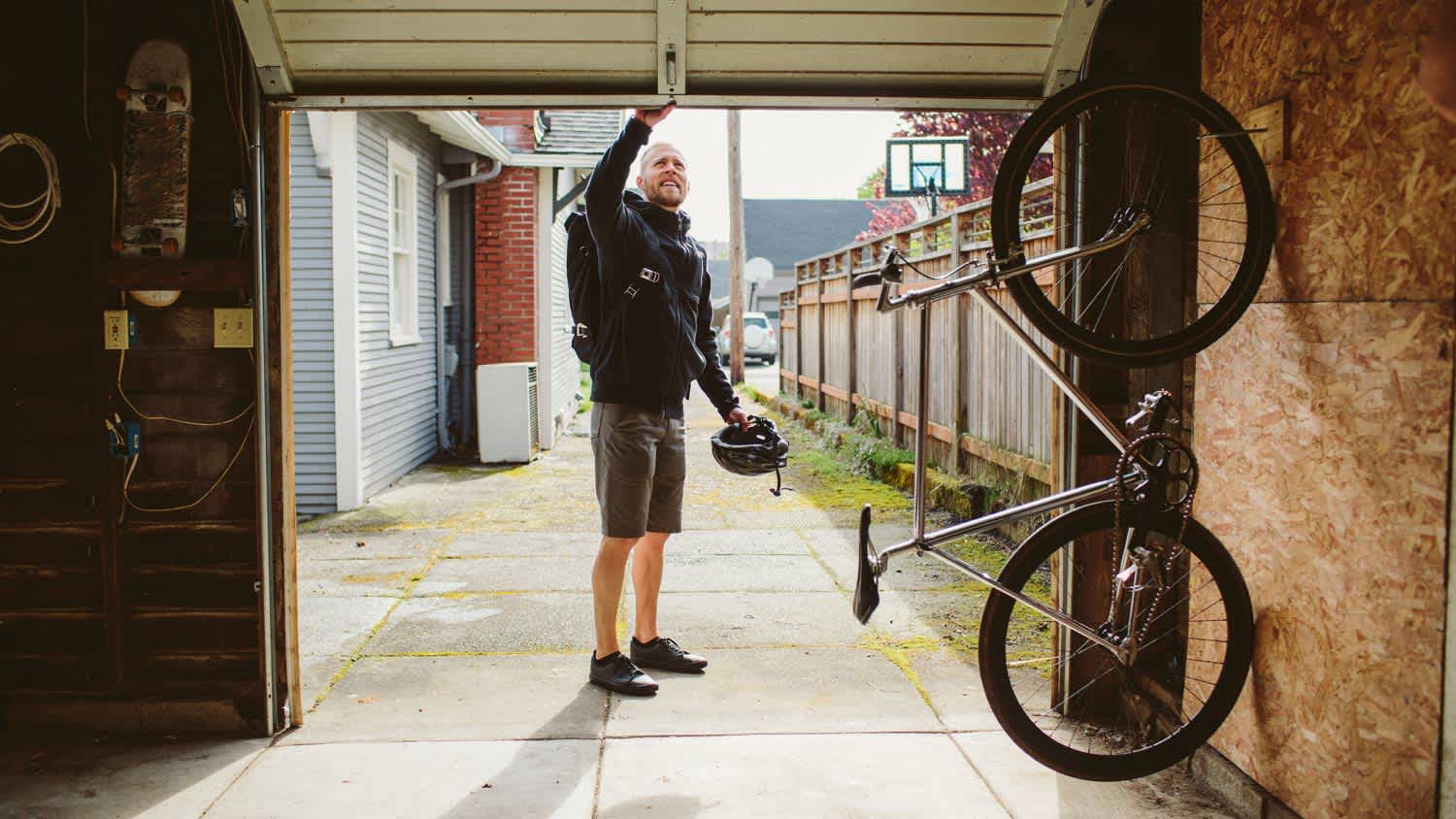 A man opening his garage door