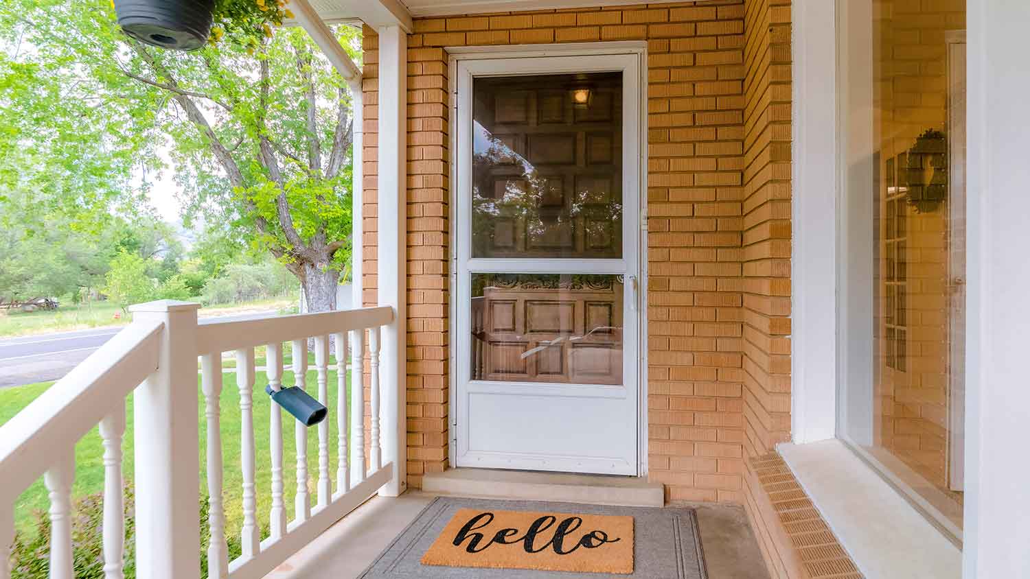 House porch with white storm door