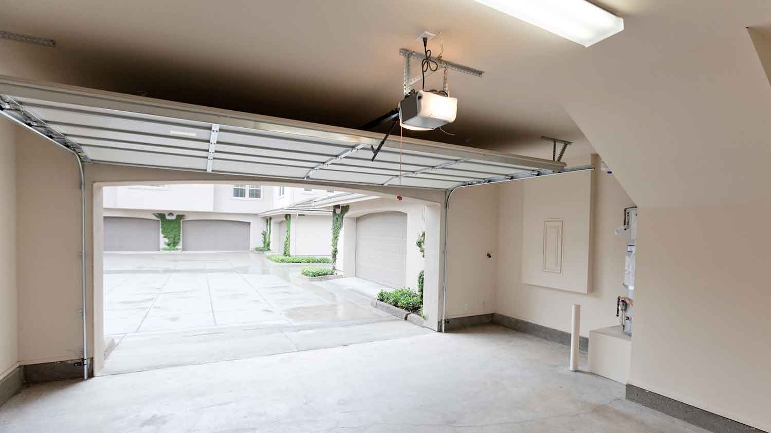 Empty garage interior with open door