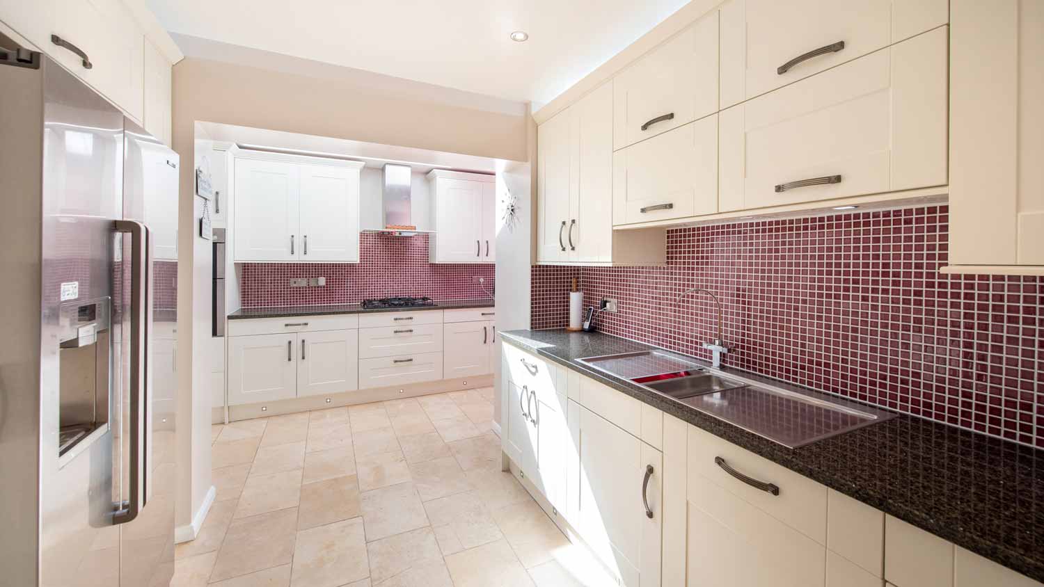 Mosaic tiles on the walls of a modern kitchen