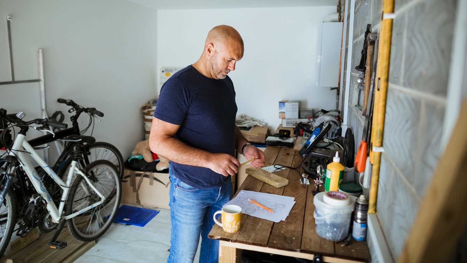 Man working in garage.