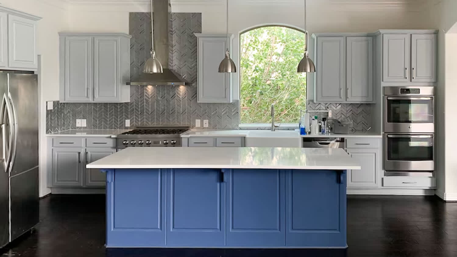Gray kitchen with blue island