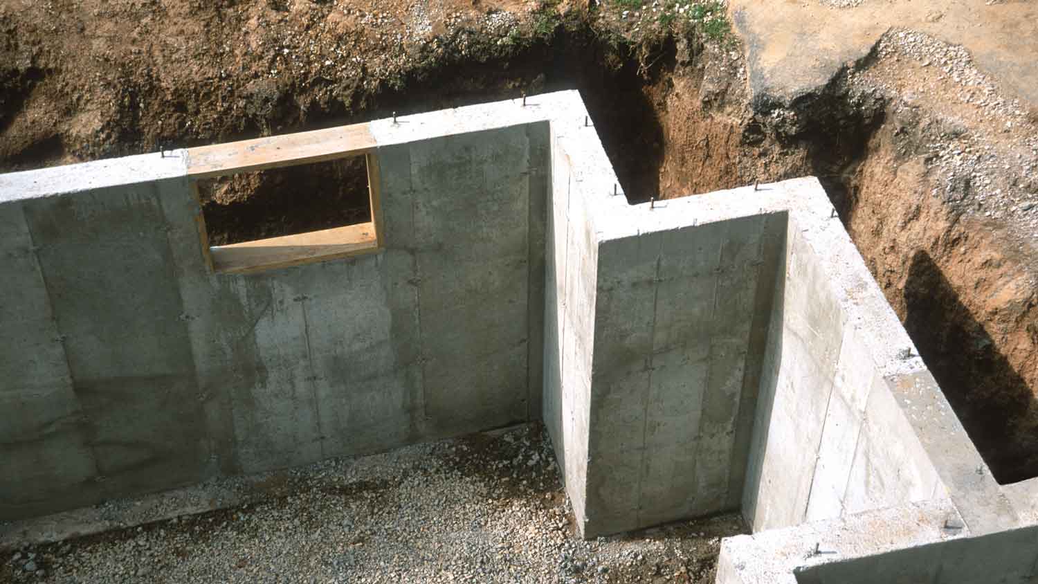 A poured cement foundation wall
