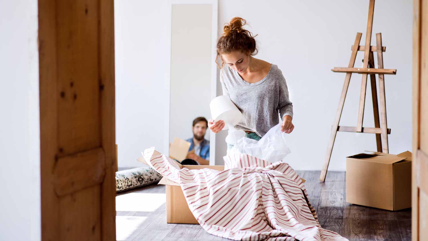 Woman packing a lamp