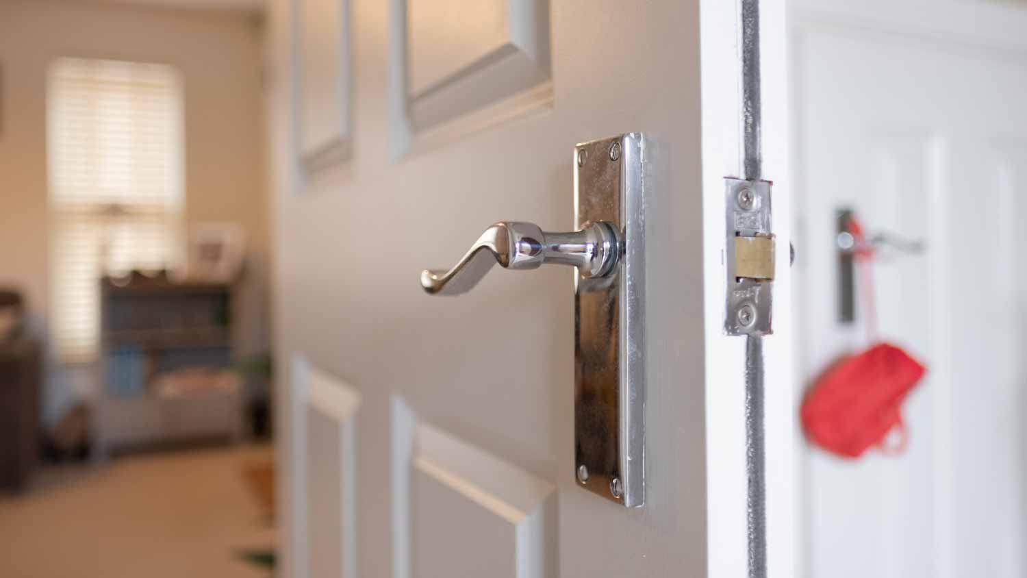 An open white fire door