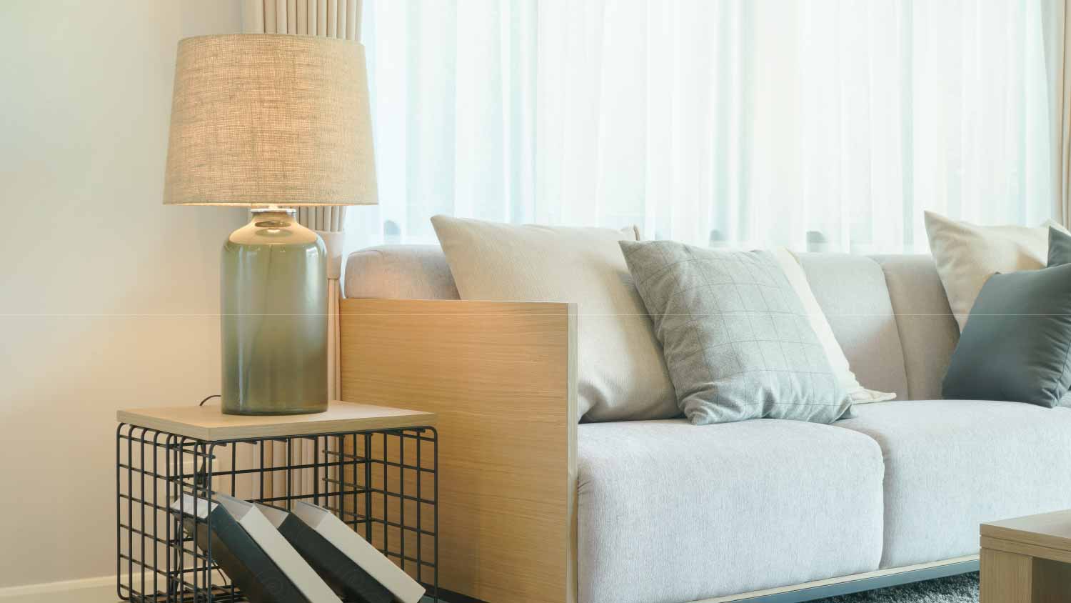 Table lamp next to comfy sofa