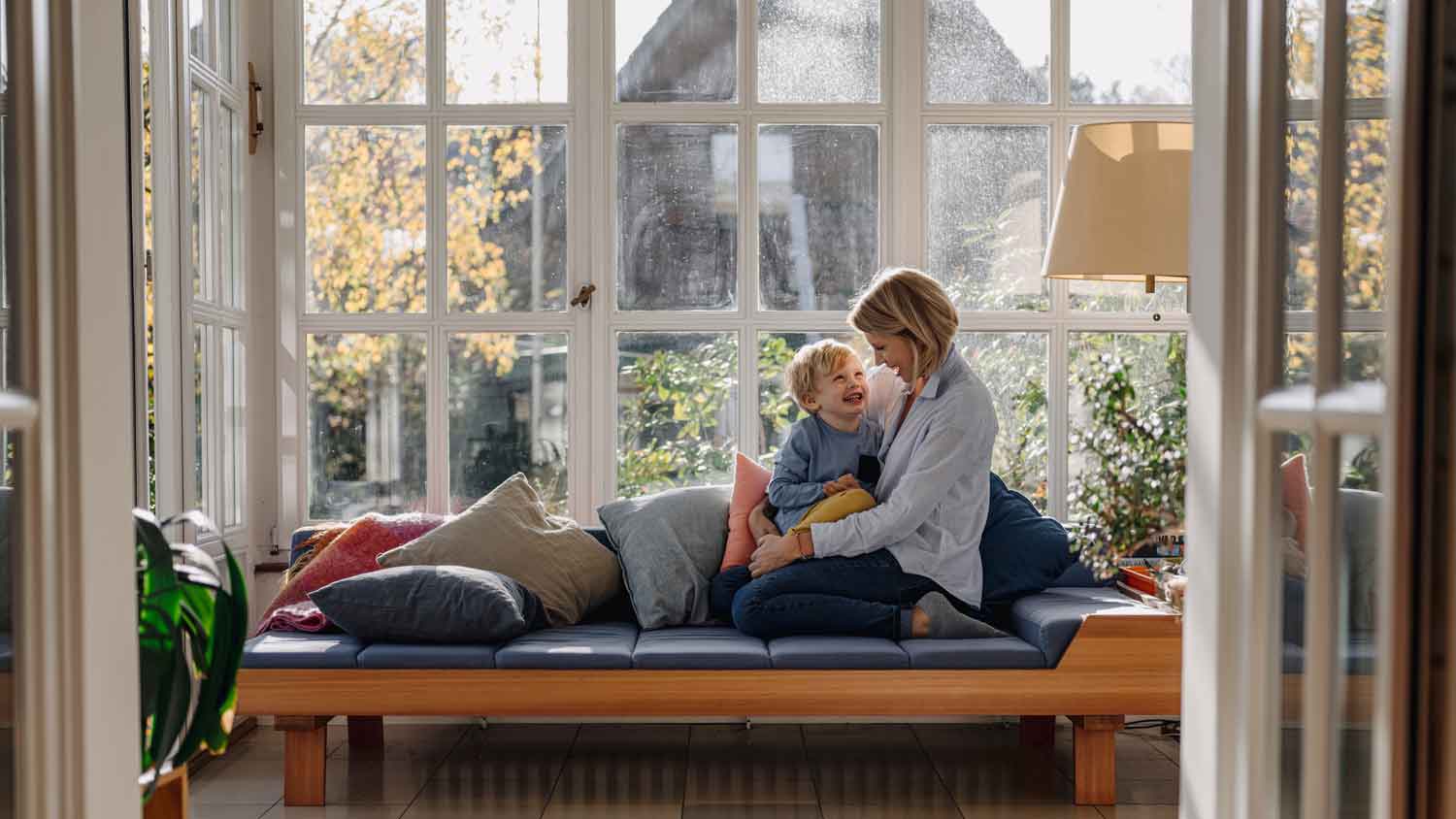 woman and child together in sunroom