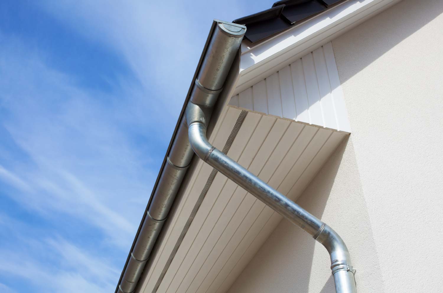 A close up of a zinc gutter system