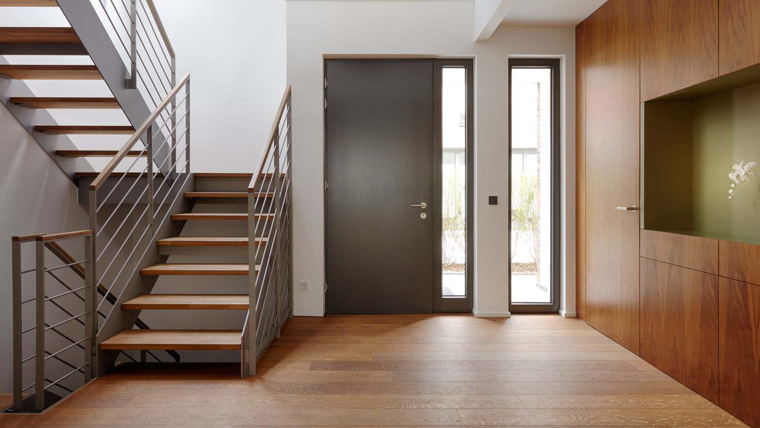 Modern entryway with hardwood floors
