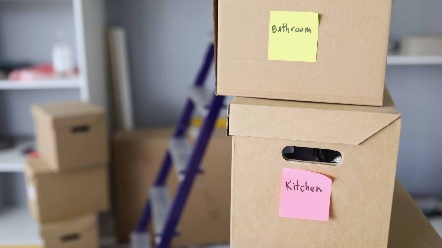 Boxes with moving items in the room