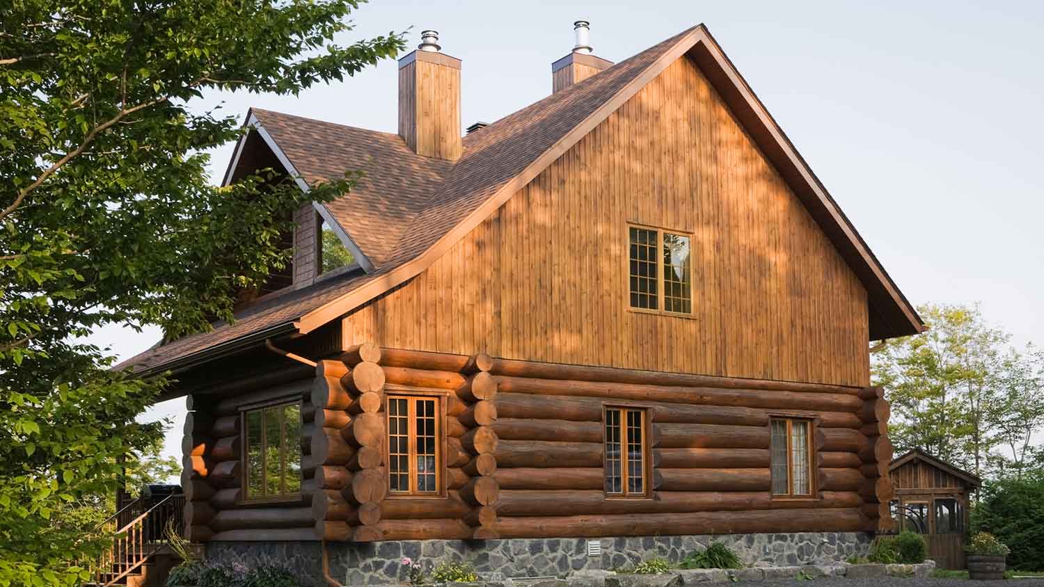 Large cabin exterior with cedar siding