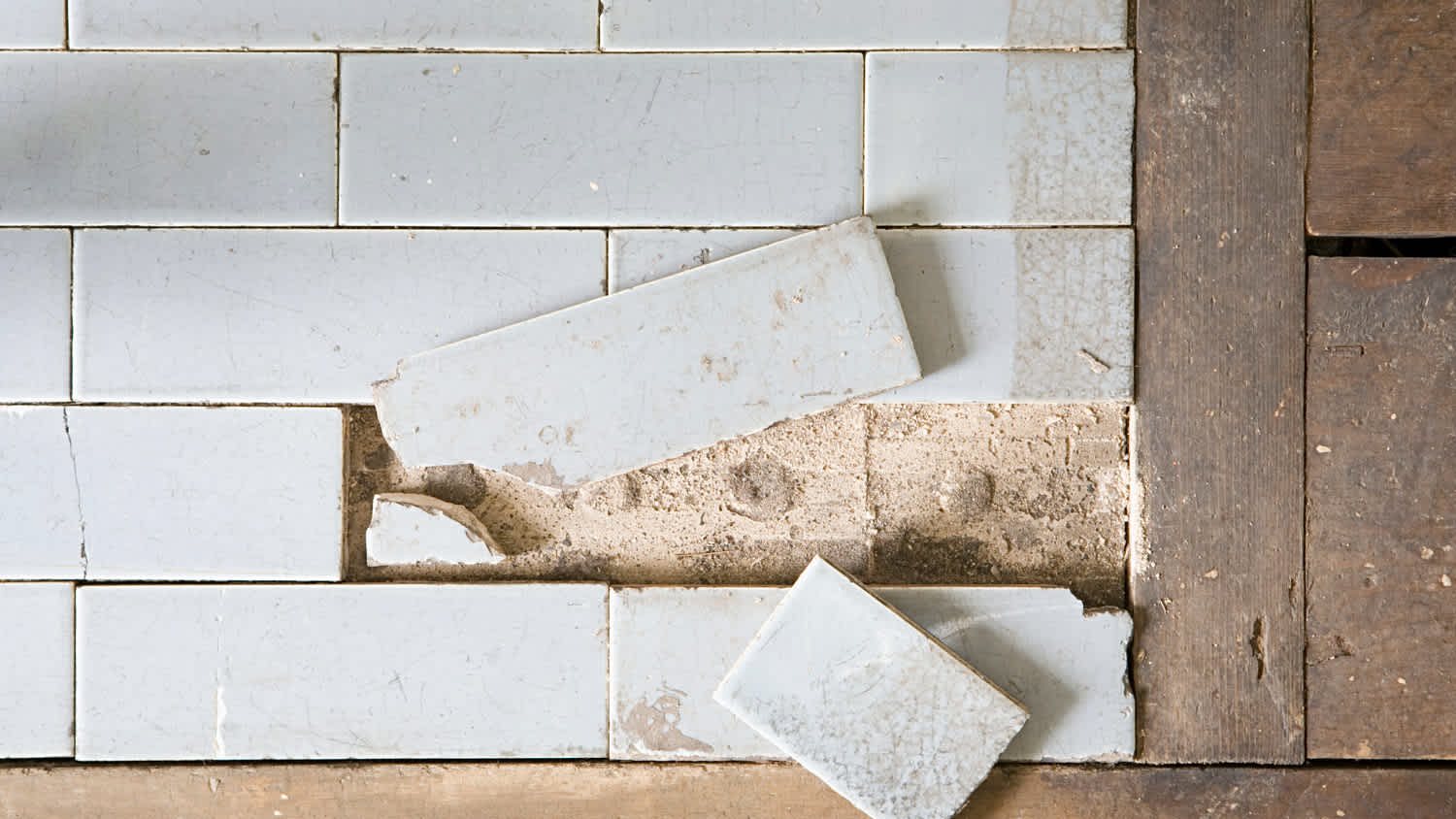 Broken white old tiles