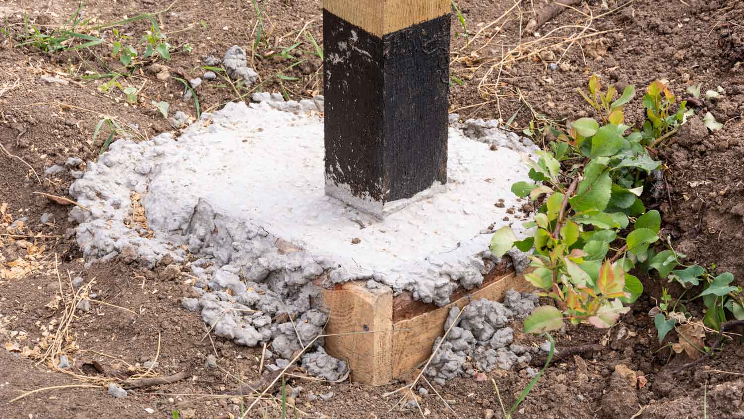 A buried post footing