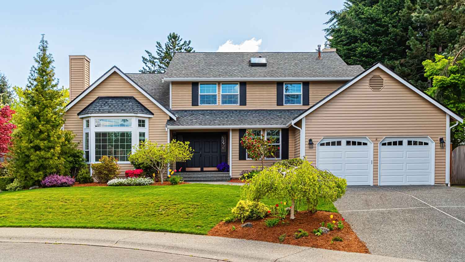 A suburban house with a beautiful landscaped garden