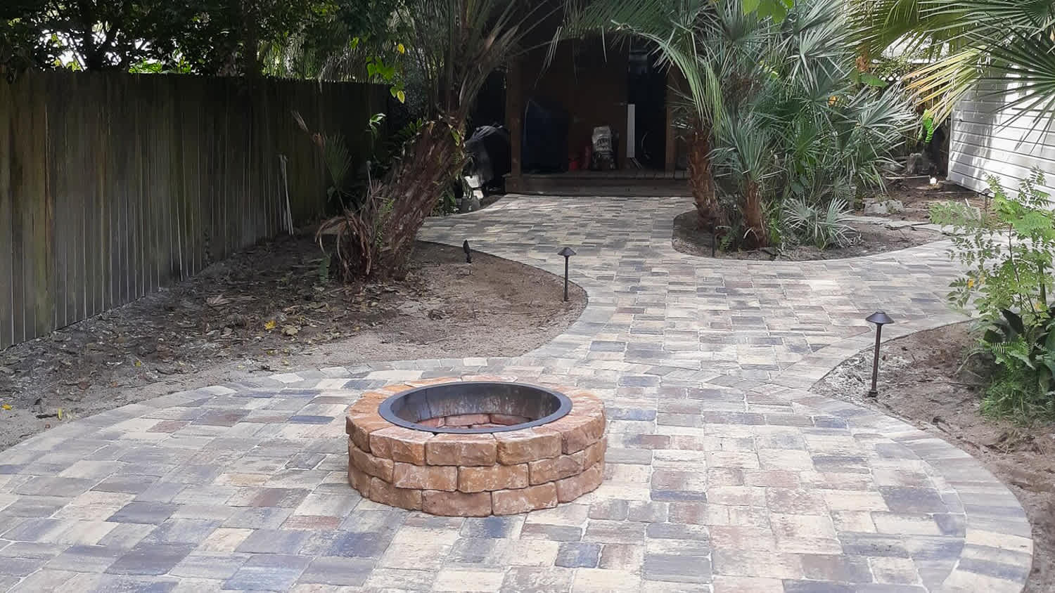 Backyard garden with paver patio