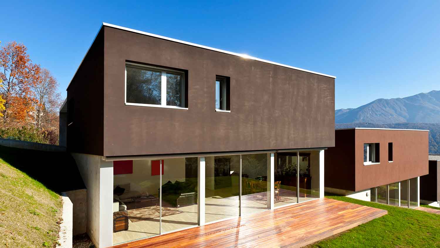 Contemporary home exterior painted dark gray