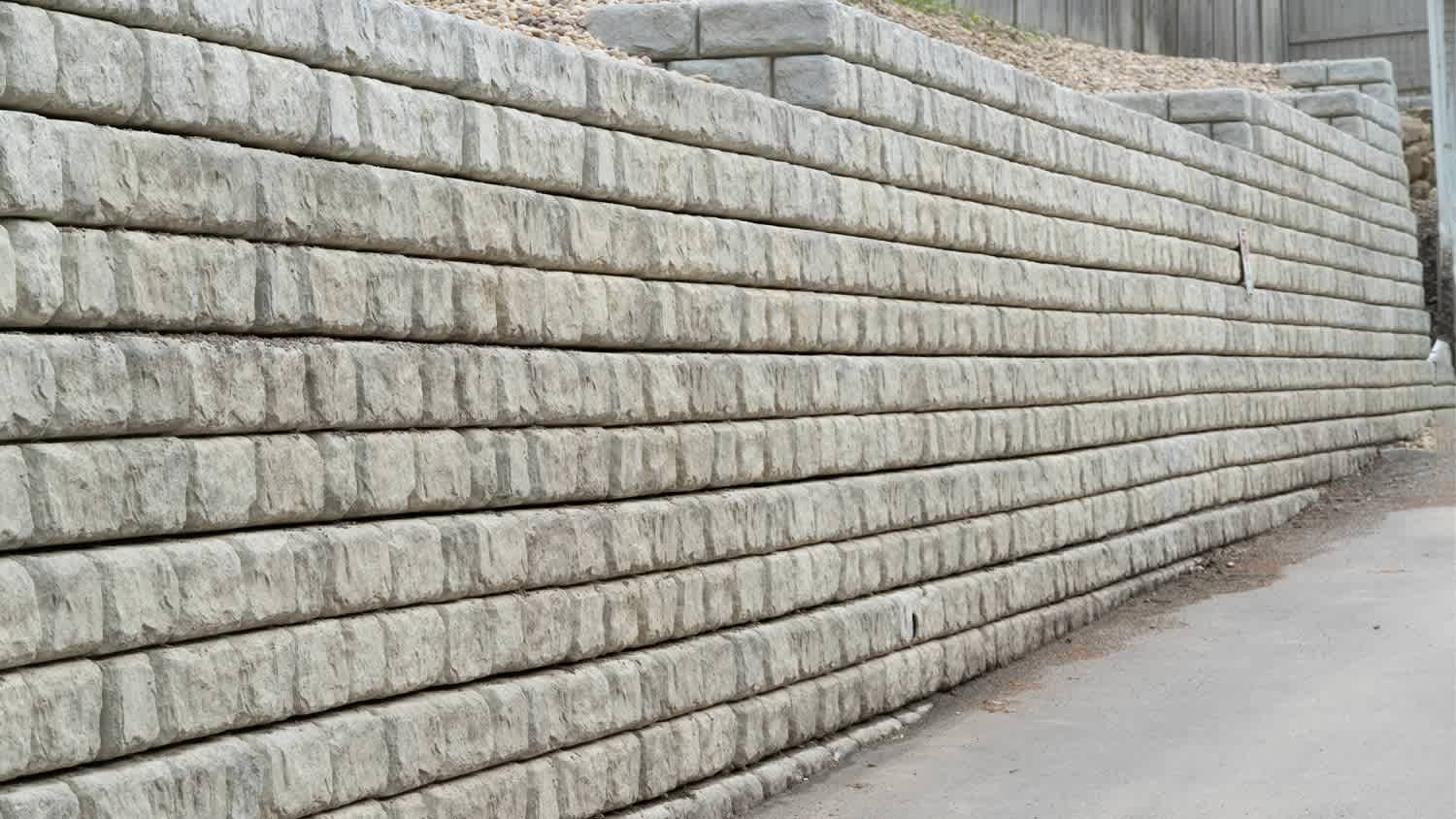Gray retaining wall in driveway