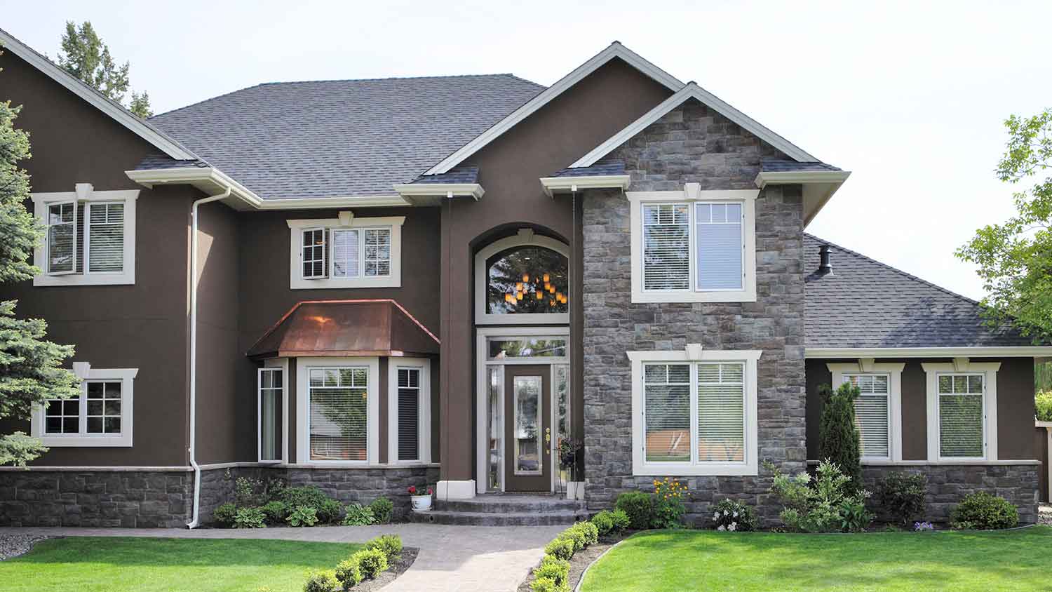Taupe home exterior with stone siding