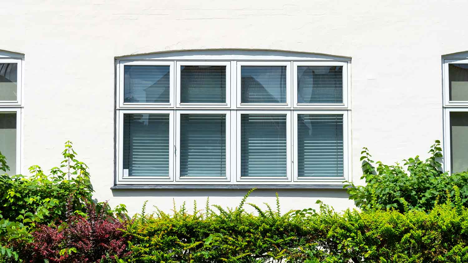 Building exterior with cottage style window