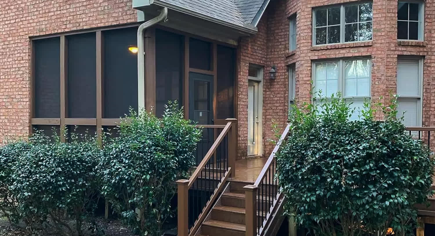 Screen porch in a brick house
