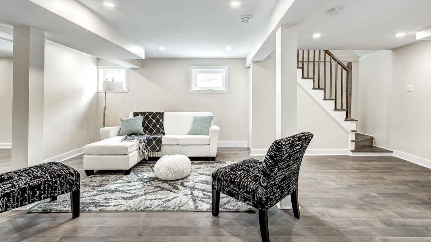 Finished basement with vinyl flooring