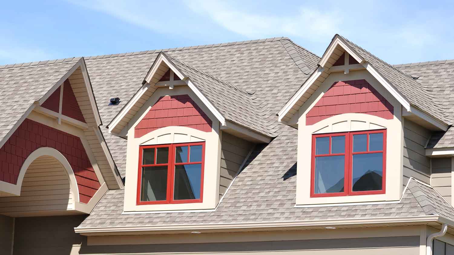 Home with two gable dormer windows