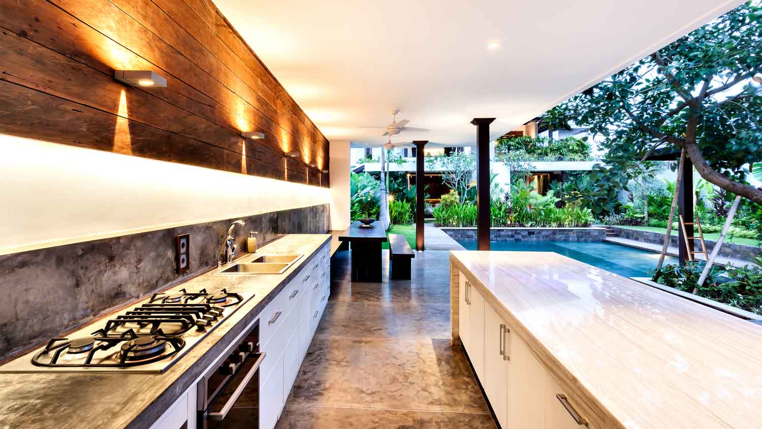 An outdoor kitchen with a stove