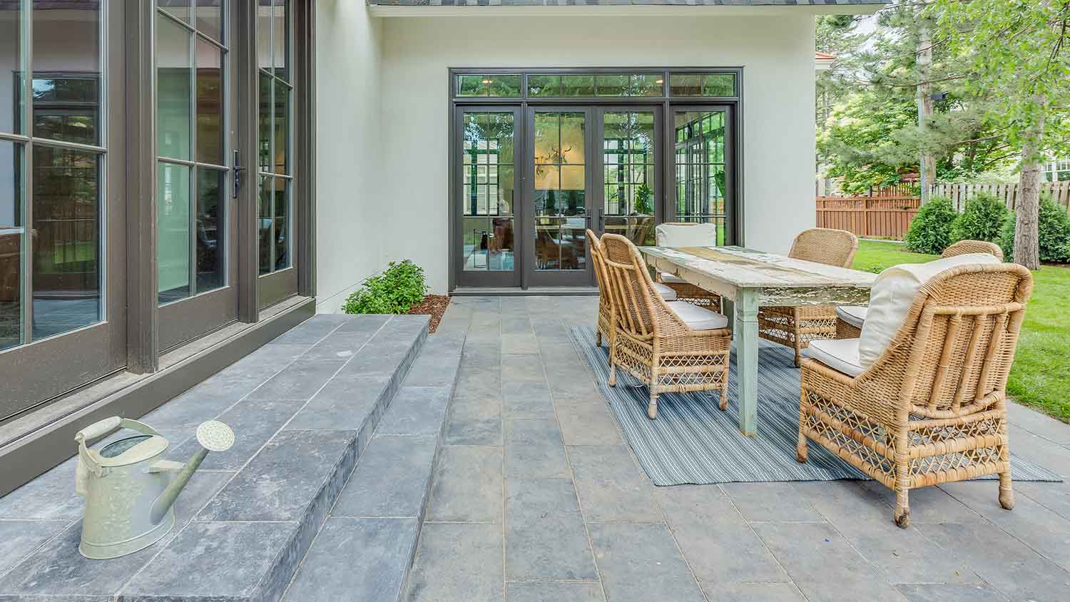 Outdoor dining area with stone flooring
