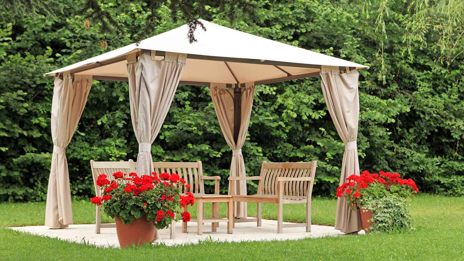 Backyard gazebo with curtains