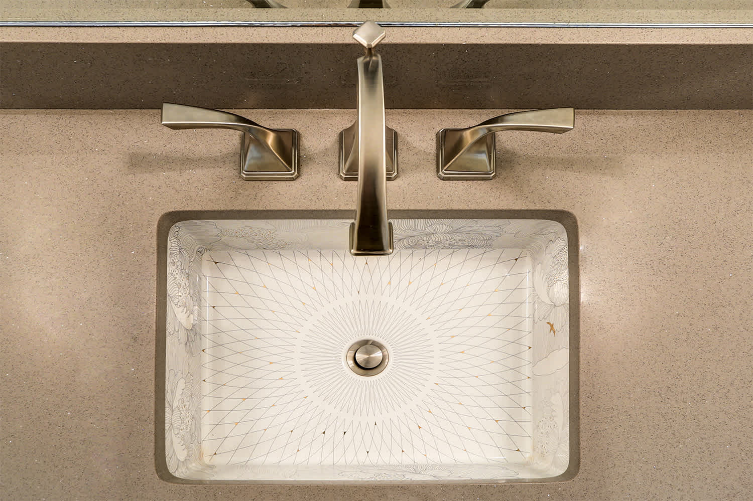 Undermount sink with intricate design