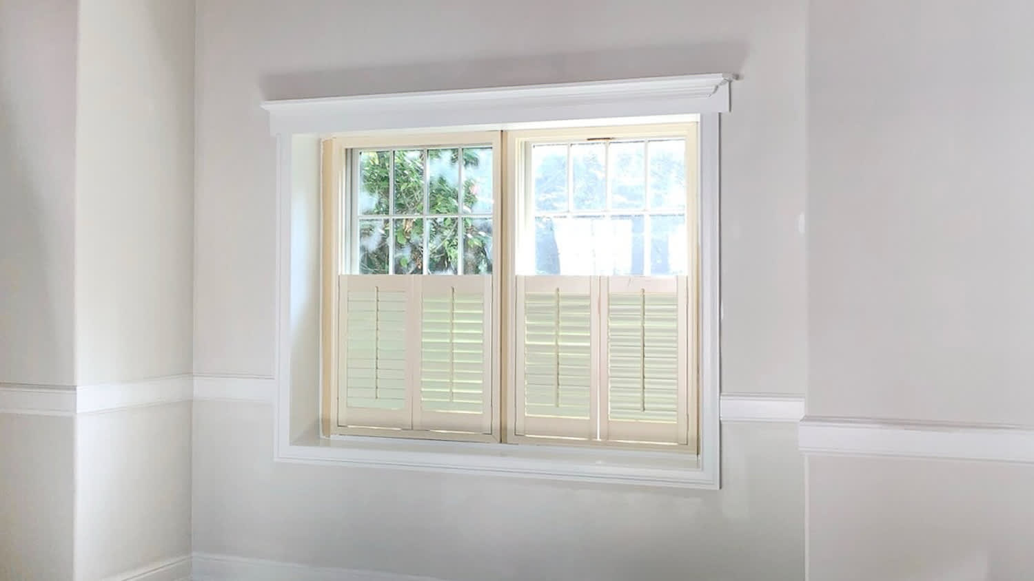 Single window in white wall