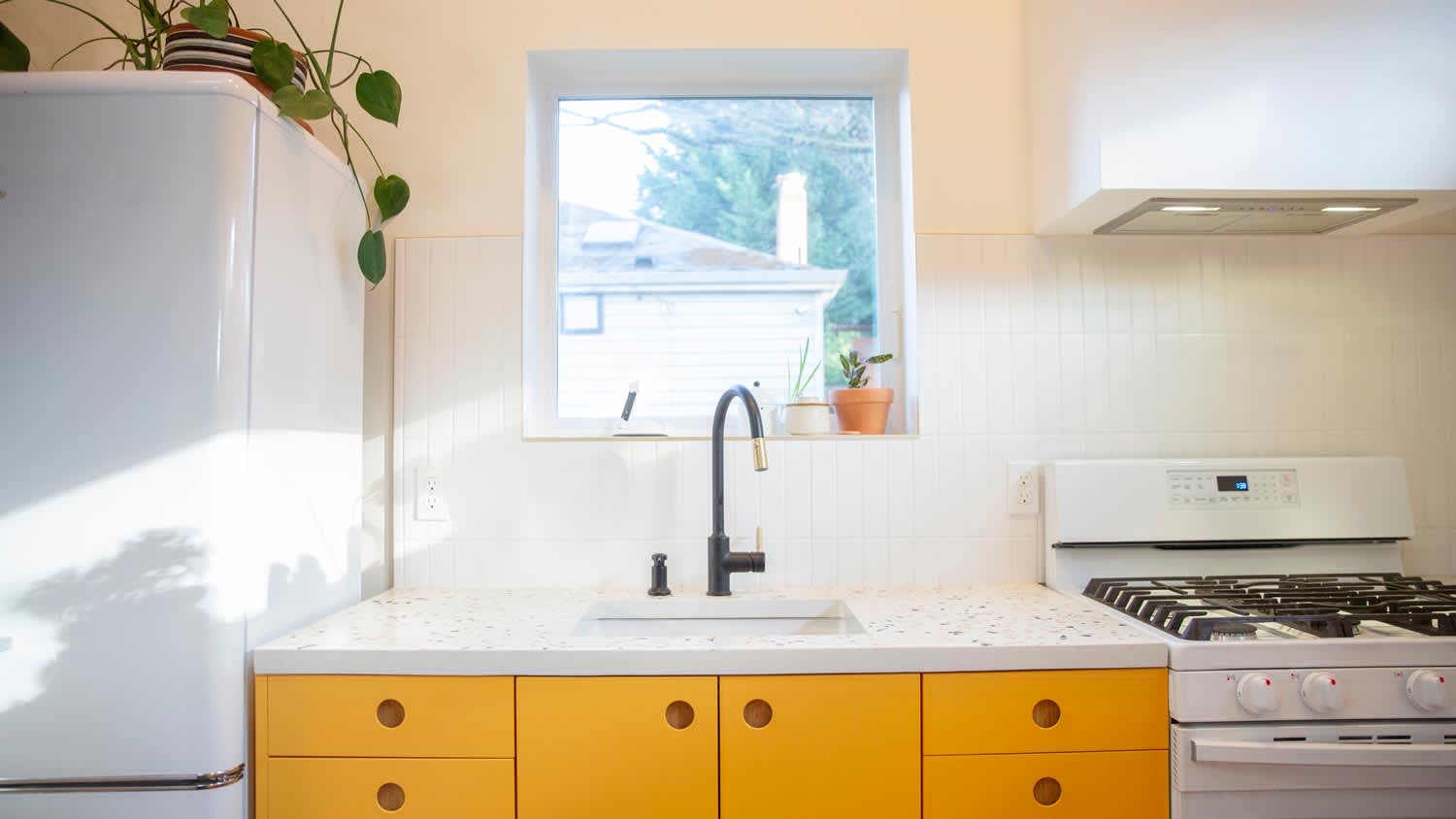 A bright kitchen with terrazzo countertop