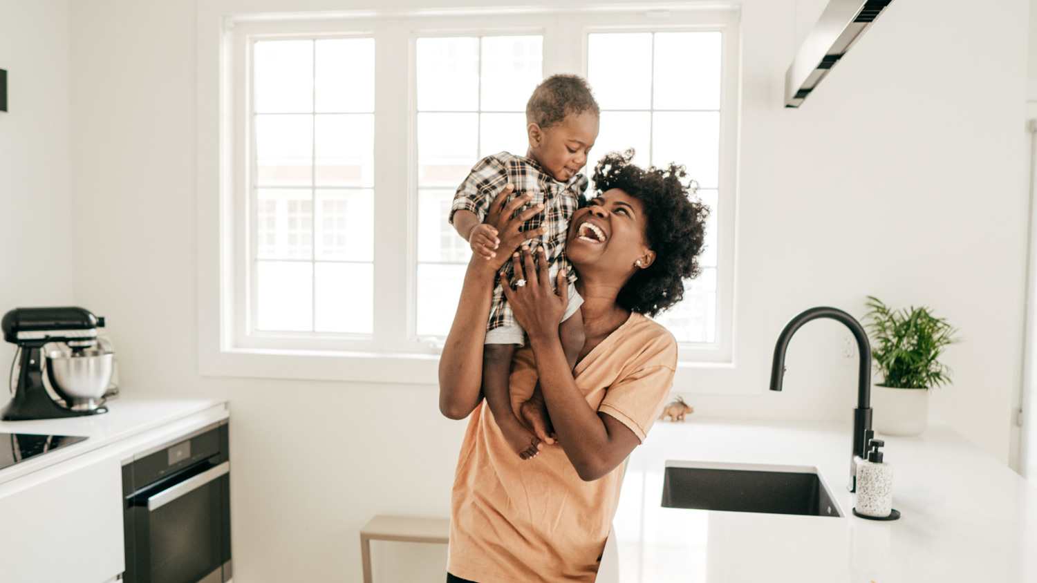 Mother and baby in the kitchen