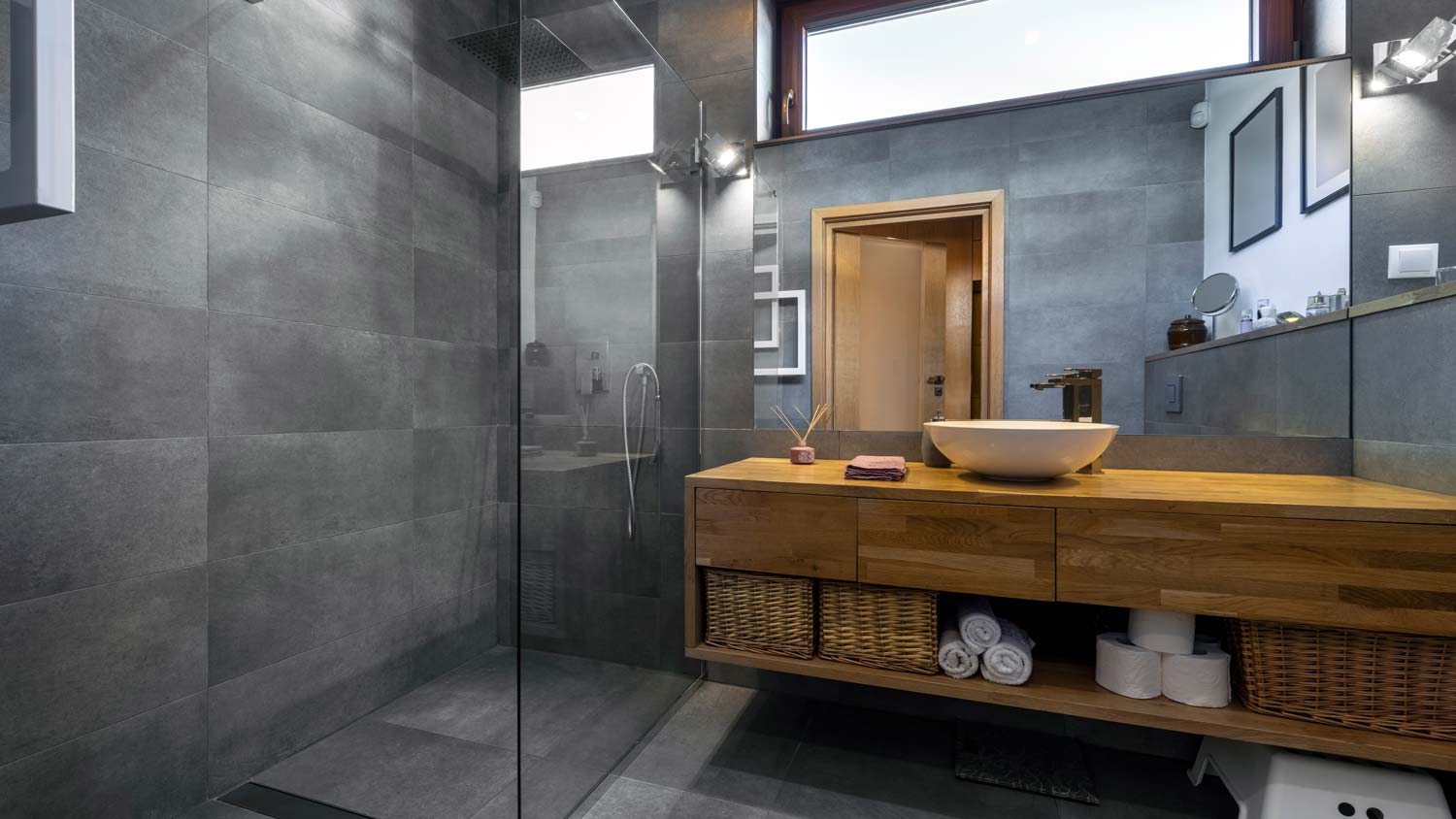 A solid surface shower in a minimal bathroom