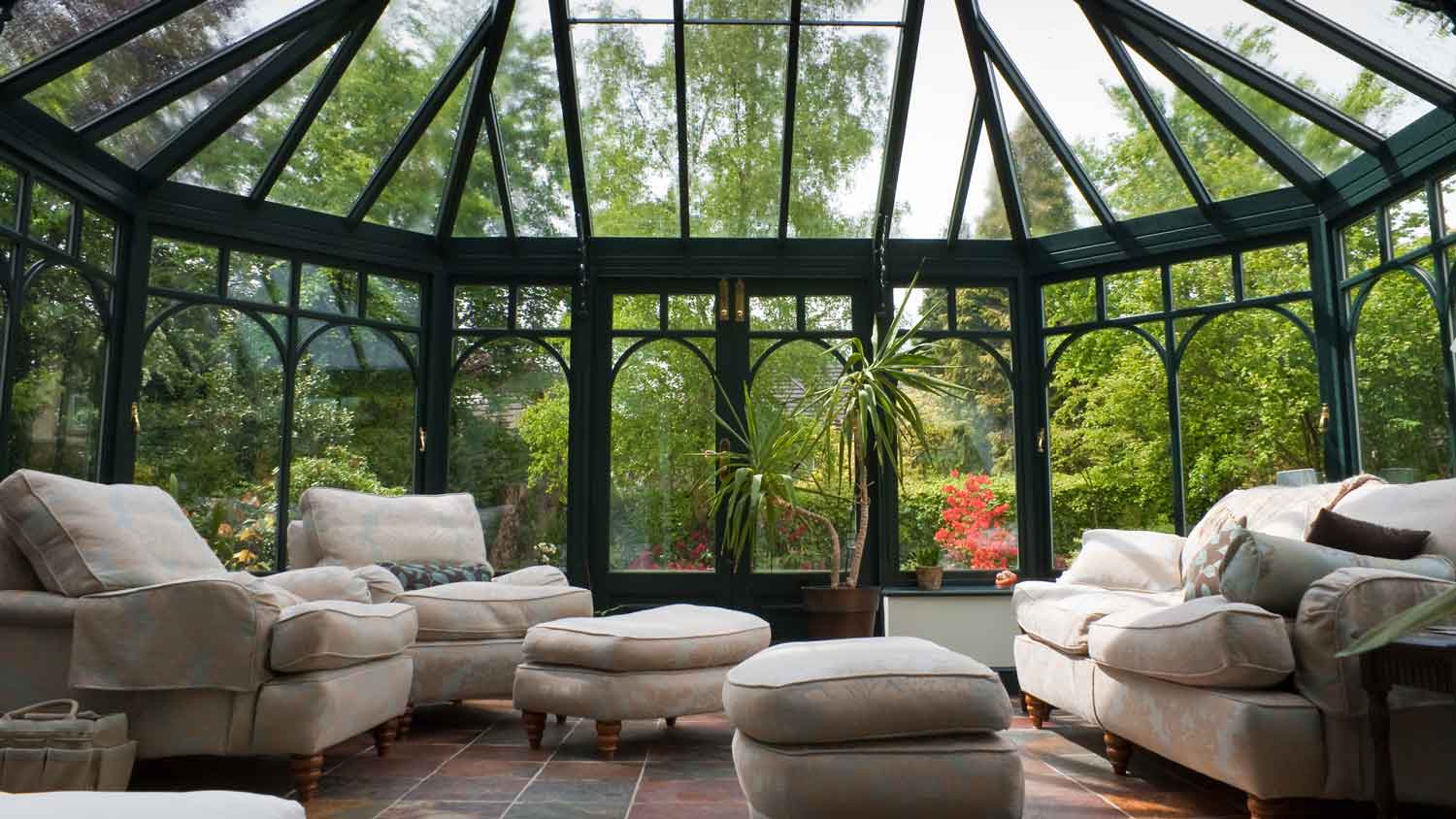 A beautiful solarium with beige furniture