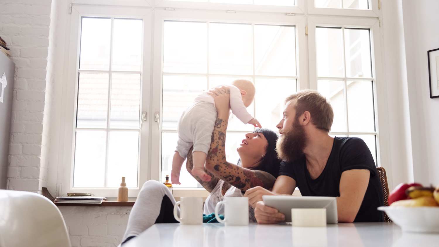 Young Family With Newborn Baby