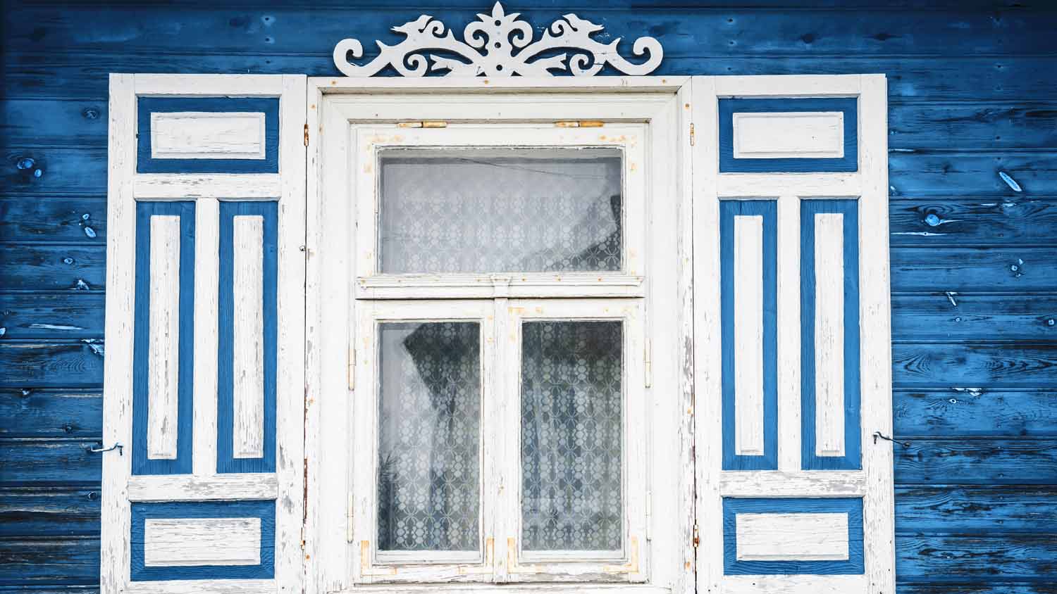 cottage with wooden antique window