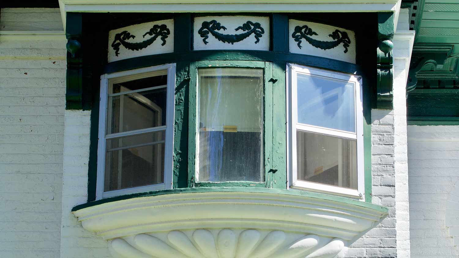 old bay windows in brick home