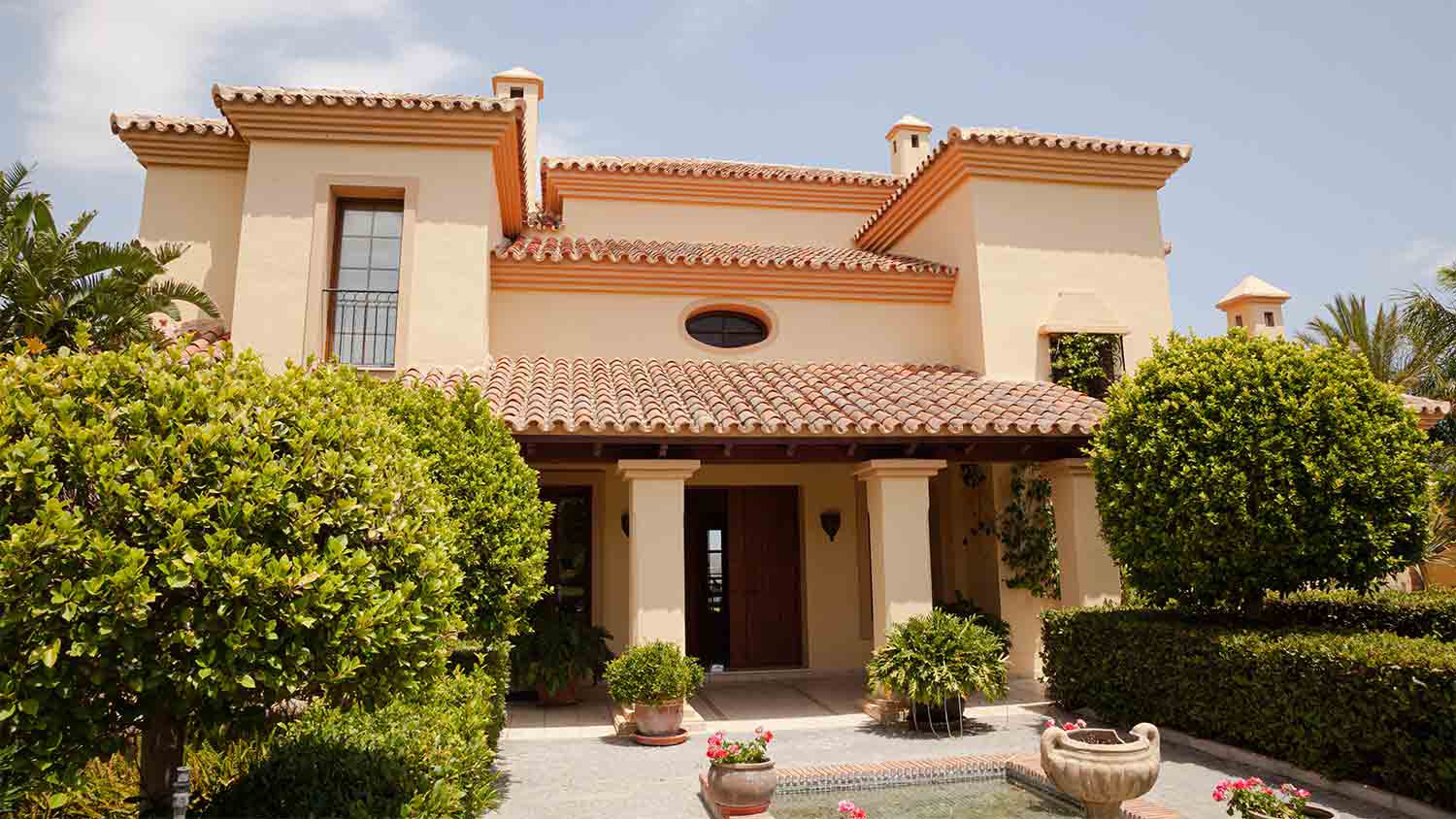 An exterior view of a stucco house