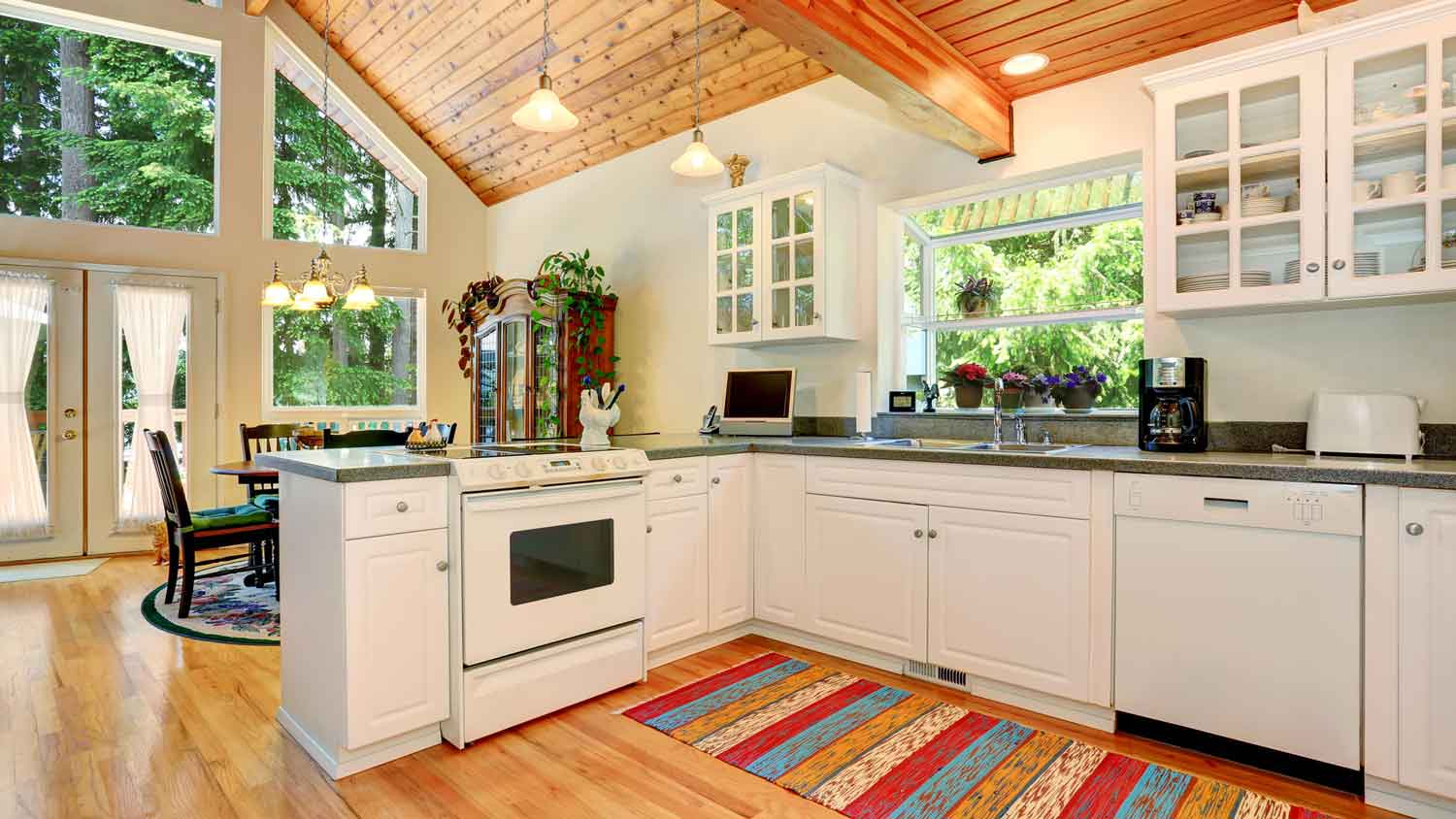 A spacious kitchen with a garden window